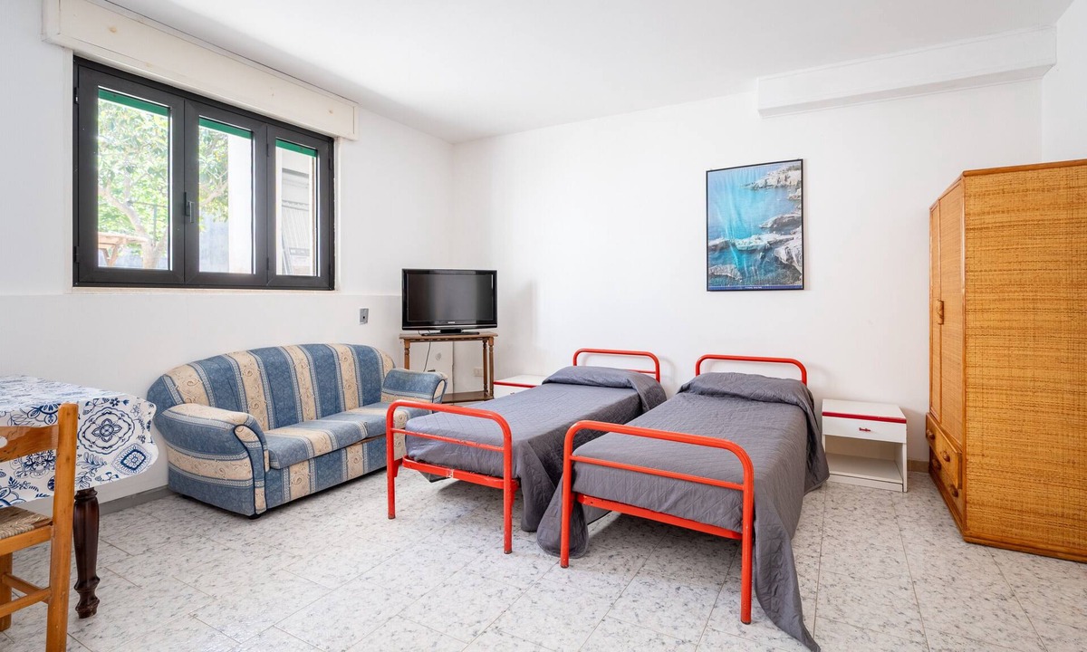 Torre Specchia Ruggeri House | Apartment 'Villa Ruggieri - Semiterra' with Private Terrace and Garden