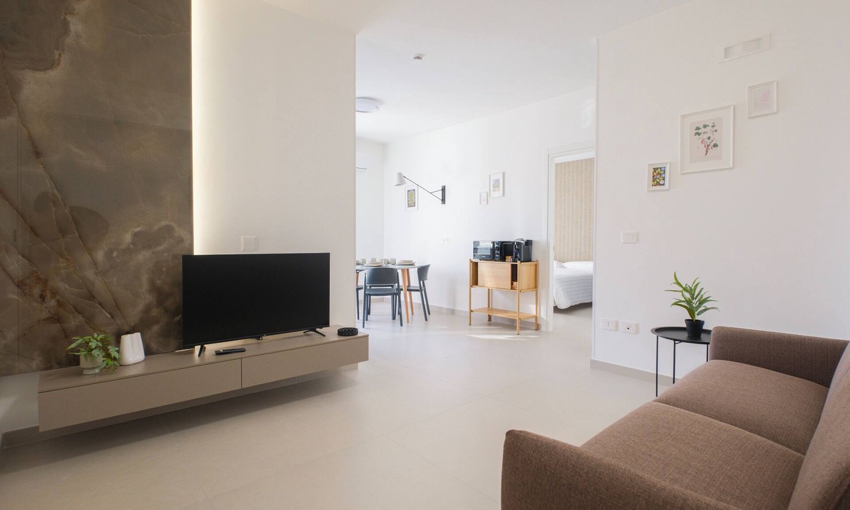 Marcianise Apartment | ARQO Apartments - Spacious Apartment with 2 Bathrooms and Courtyard View