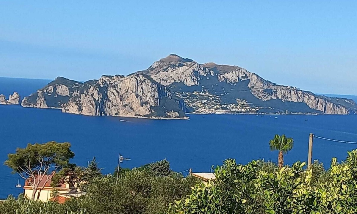 Termini Apartment | Delizia Caprese vacation home in Massa Lubrense with garden and Capri view