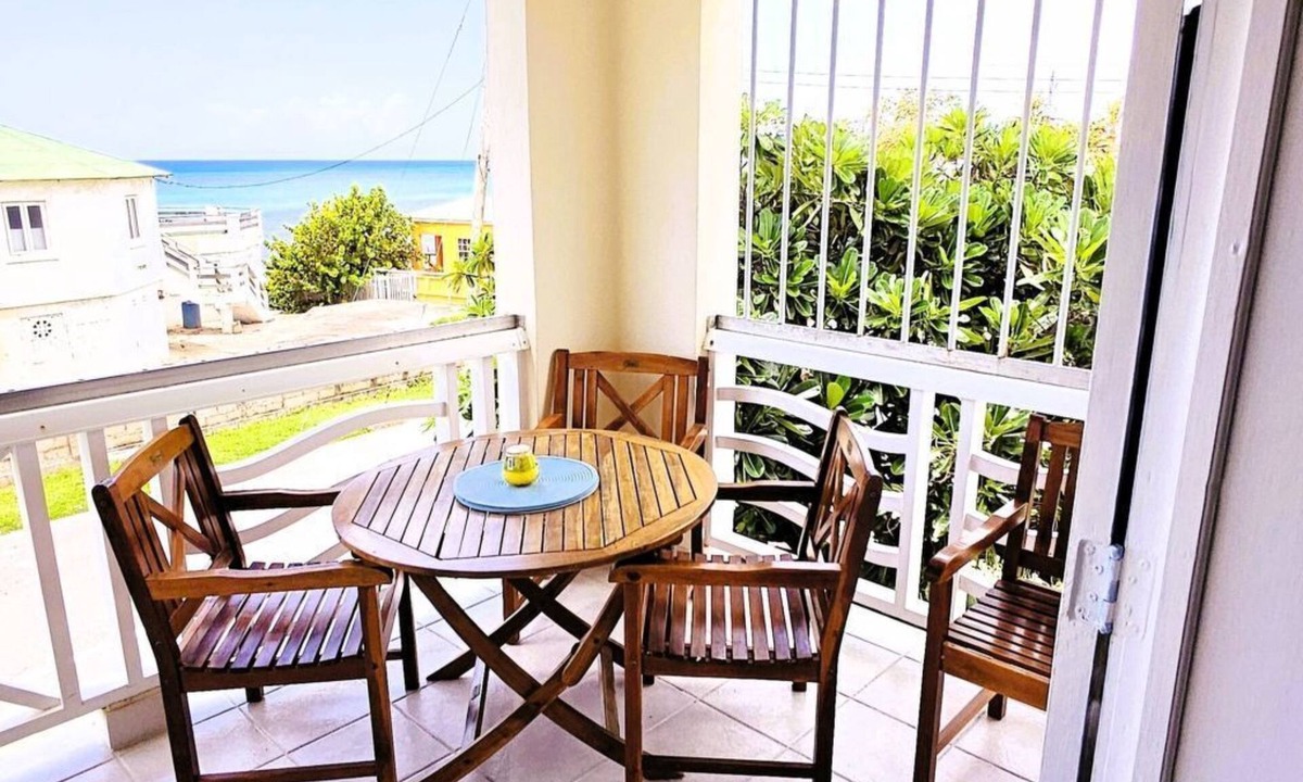 Silver Sands Apartment | "Island Getaway Apt" mit Meerblick by Interhome