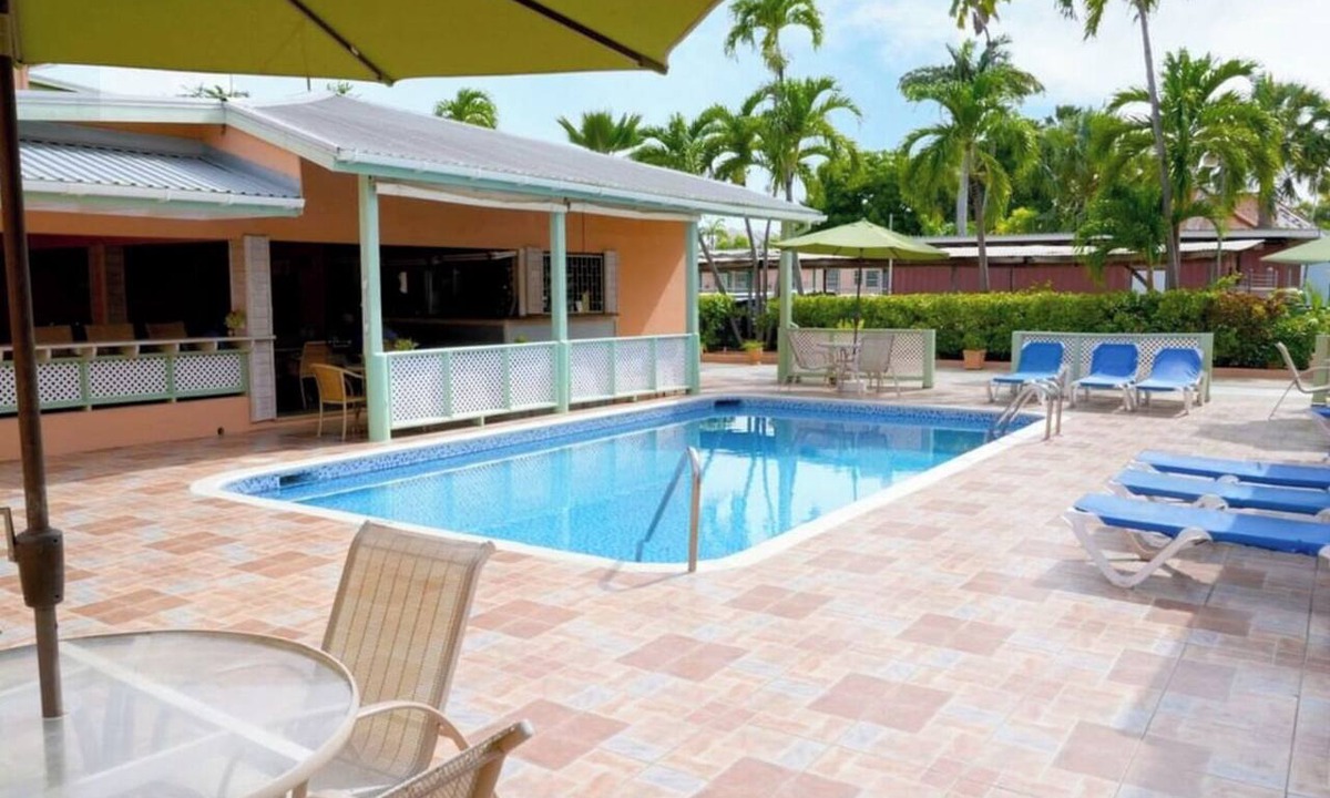 Worthing Apartment | Wake Up Steps from Worthing Beach & Island Charm