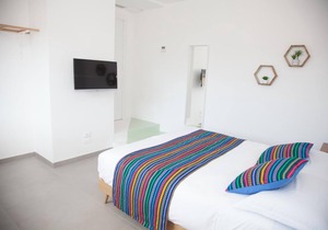 Green apartment with double bedroom and living room / kitchen with sofa bed and private bathroom in napoli