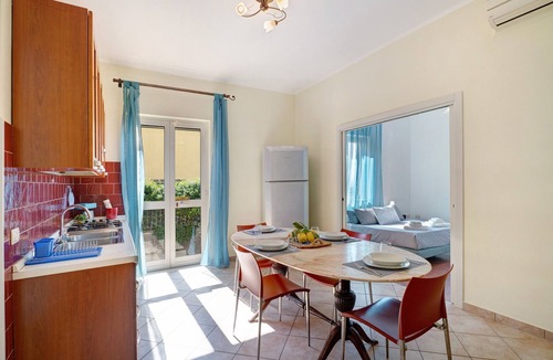 Meta Apartment | Apartment 'Ebbrezza Di Mare' with Sea View, Private Terrace, Air Conditioning, and Wi-Fi
