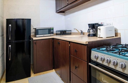 St. Lawrence Gap Condo | Beachside Bliss: Spa, Pool & Nightlife Nearby