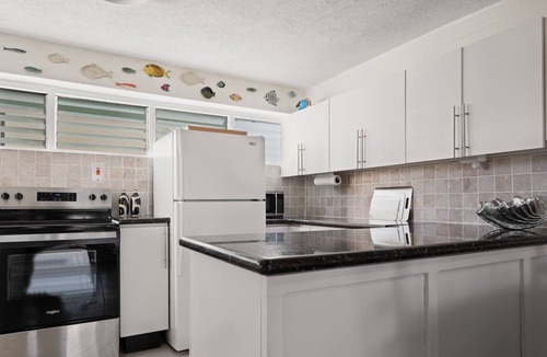 Bayville Condo | Bright Interior-Designed Condo Near Bridgetown, UNESCO Garrison & Beaches
