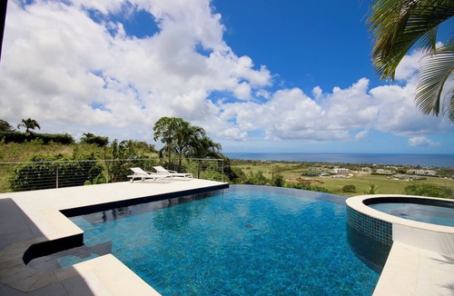 Deanes Villa | Caribbean Dream wows with ocean views from the sunny poolside deck.