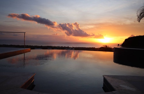 Deanes Villa | Caribbean Dream wows with ocean views from the sunny poolside deck.