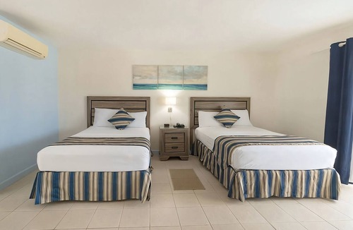 Dover Hotel | Caribbean Poolside Escape with Balcony and Beach Access