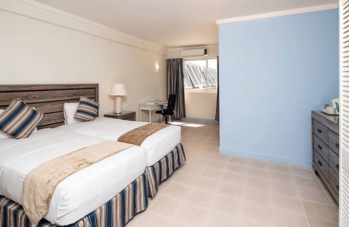 Dover Hotel | Caribbean Poolside Escape with Balcony and Beach Access