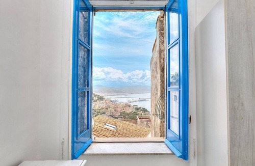 Raito House | Casa Raia: A characteristic two-story independent house located in the heart of a little village facing the sea, with Free WI-FI.