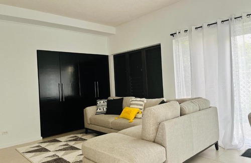 Boarded Hall Apartment | Chic Retreat BB, Bright, Gated 2BR Condo with pool and wifi