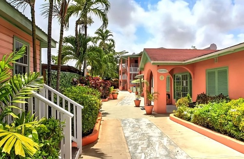 Rendezvous House | Explore Scenic Worthing Beach! Room w/Private Balcony & Kitchenette!