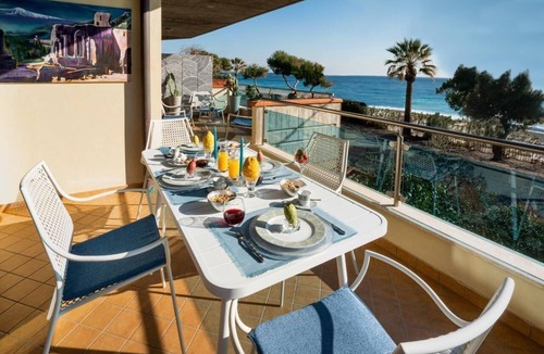 Mazzeo Apartment | Flat directly on the beach Terrace and shared pool