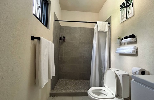 Rendezvous Apartment | Lovely 2-bedroom apartment with AC, 15 min walk from the South Coast Main Road
