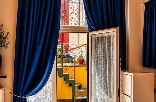 Chiaia Apartment | Mosahouse Naples Cozy terraced attic just steps from the sea