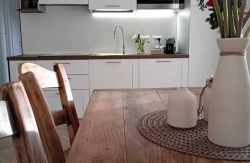 Bordighera Apartment | New one-bedroom apartment with residential pool, private garden and exclusive parking space