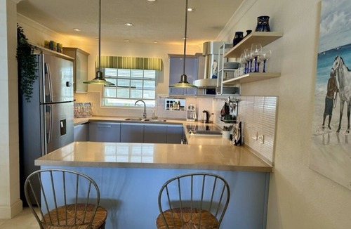 St. Lawrence Gap Condo | REDUCED SUMMER RATES TO A SANDY BEACH AND SWAYING PALMS!