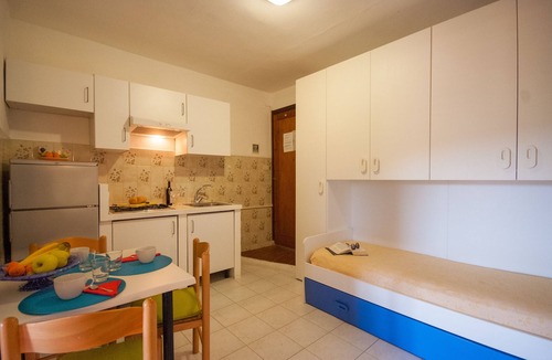 Capoliveri Resort | Residence La Valdana - 4 person apartment with swimming pool, tennis and parking 1km from the beach