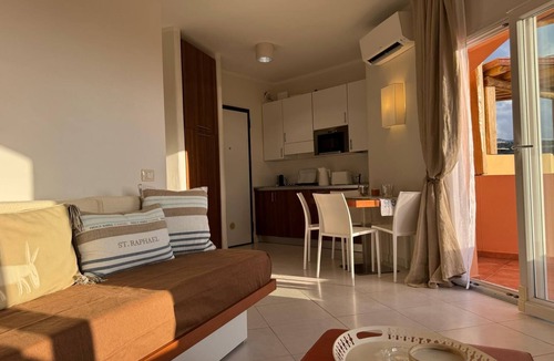 Canneddi Apartment | Sunset Costa Rossa 1221 - Enchanting sunset sea view Cala Rossa Sardinia