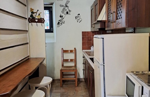 Massarosa Apartment | Typical rustico with garden, beautiful view, WiFi, air cond, washer, 12 km sea
