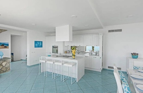 Sant'Agata sui Due Golfi Villa | Villa Irta: A bright and sunny two-story villa built sheer above the sea, with Free WI-FI.