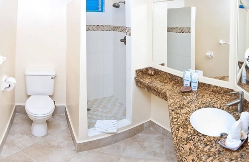 St. Lawrence Gap Hotel | Where Great Memories Begin! Balcony, Oceanfront, Outdoor Pool, Free Parking!