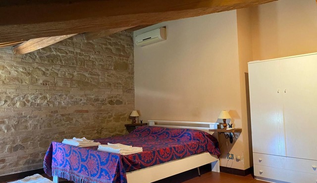 Attic Room with Private Bathroom in a Historic Villa Farmstay in Marche