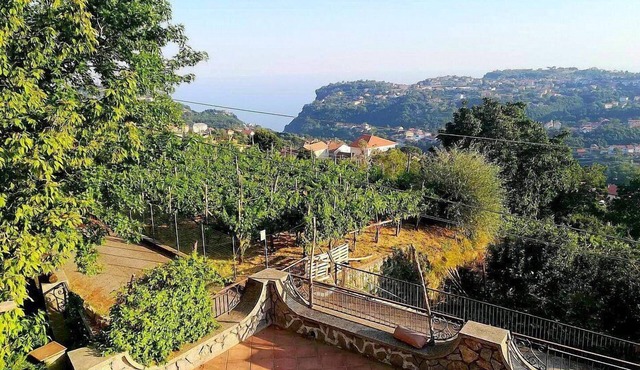 Casa Rosea: A characteristic two-story apartment that is part of a villa built sheer above the valley, with Free WI-FI.
