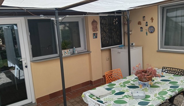 Cozy and quiet two-room apartment with garden a short distance from the sea. in Piombino