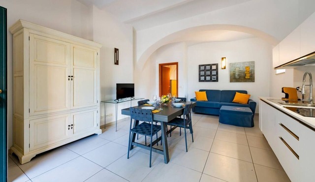 GuestHost - A comfortable and welcoming 64 square meters apartment, perfect for four people, located on the ground floor of a renovated period villa with a private entrance.The property is located in Alba Adriatica, a town famous for its long sandy beach