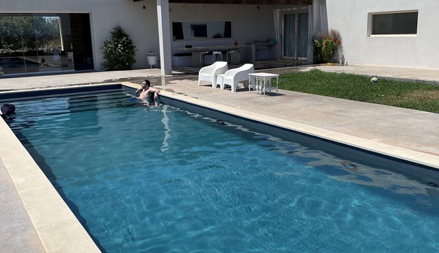Modern Villa, spectacular private pool with sea view, only 3 minutes to beach! in Serranova