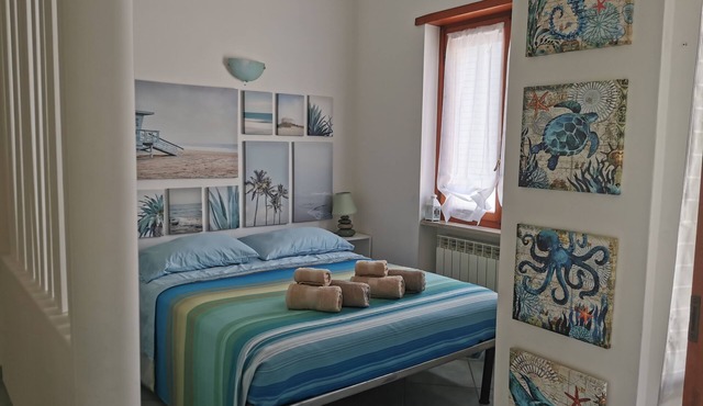 One-bedroom apartment 50 m from the beach with A/C, WiFi, terrace & parking