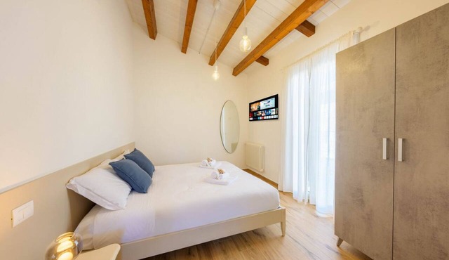 Spacious two-level suite with a kitchen and private terrace in the heart of Atri.Welcome to the Torre Room by Domio, the most exclusive, spacious, and private accommodation in the entire “Residenza del Corso.” If you’re looking for the comforts of in Atri