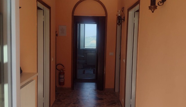 Terrace with view of hills, 7km paragliding field, 15km heliport in Rocca de' giorgi