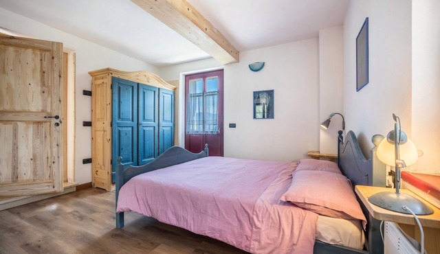 Triple Room with Kitchenette, Balcony, and Shared Garden in Ala