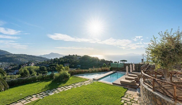 Villa Lumeria: A splendid and luminous four-story villa in a quiet position, located on a hillside above the sea, with Free WI-FI.
