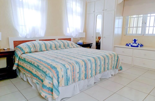 Silver Sands Apartment | Silver Sands Beachfront Condo, Indoor & Outdoor Dining, Shared Patio - Bar & BBQ