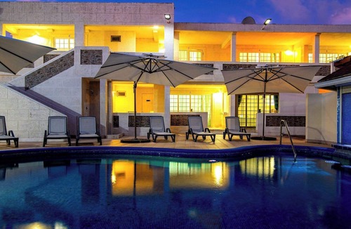 St. Lawrence Gap Condo | Beachside Comfort with Pool, Spa & Dining