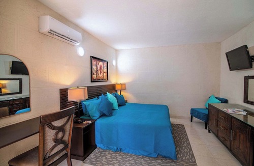 St. Lawrence Gap Condo | Cozy Room with Pool Access, and Modern Amenities