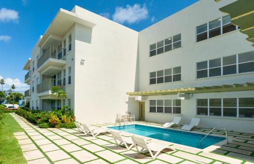 Little Battaleys Apartment | Modern 2BR Beachside Haven Ground Floor and Pool