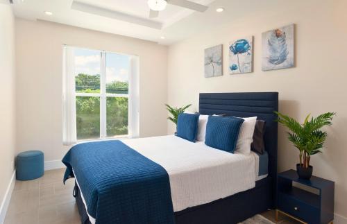 Little Battaleys Apartment | Modern 2BR Beachside Haven Ground Floor and Pool