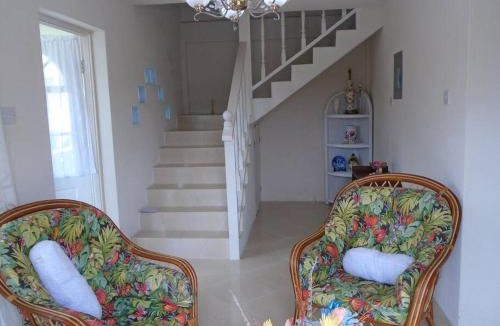 Husbands Apartment | Simply Beautiful Two Storey home/apt awaits you